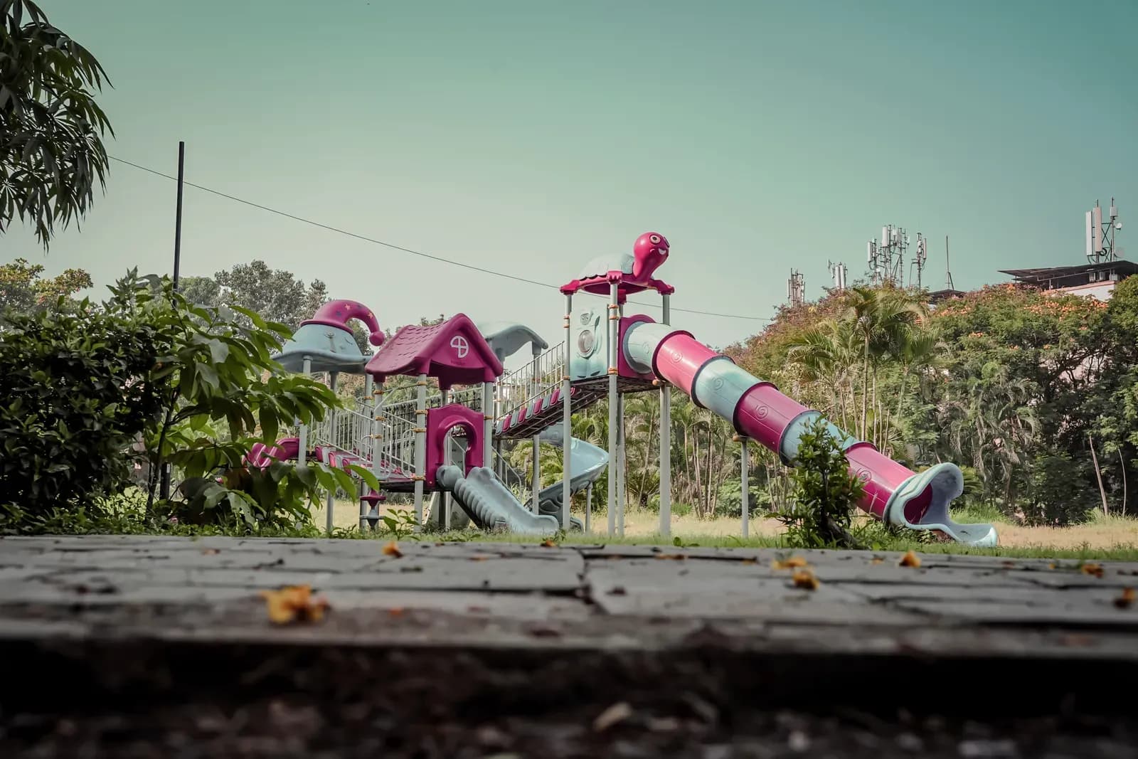 The finished landscaped recreational space at Kalamboli Sector 2: play equipment, walkways and planting