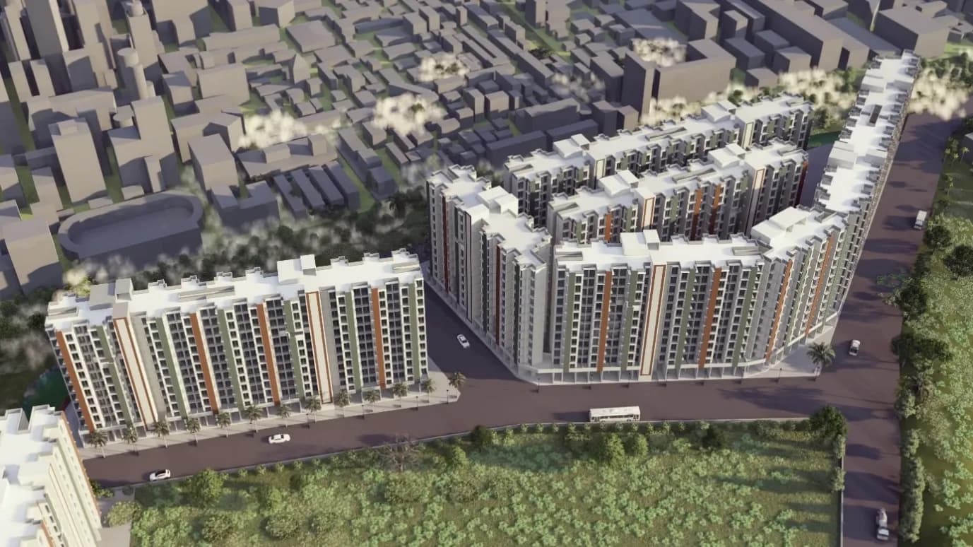 Aerial rendering of the PMAY development at Panvel: two rows of mid-rise residential blocks in white, green and terracotta around an internal road, with the existing town beyond