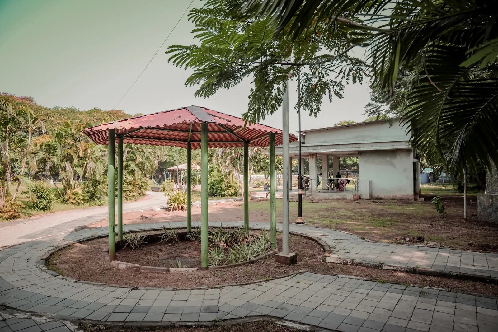 The finished landscaped recreational space at Kalamboli Sector 2: play equipment, walkways and planting
