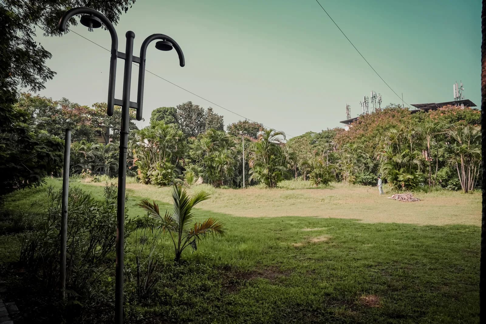 The finished landscaped recreational space at Kalamboli Sector 2: play equipment, walkways and planting