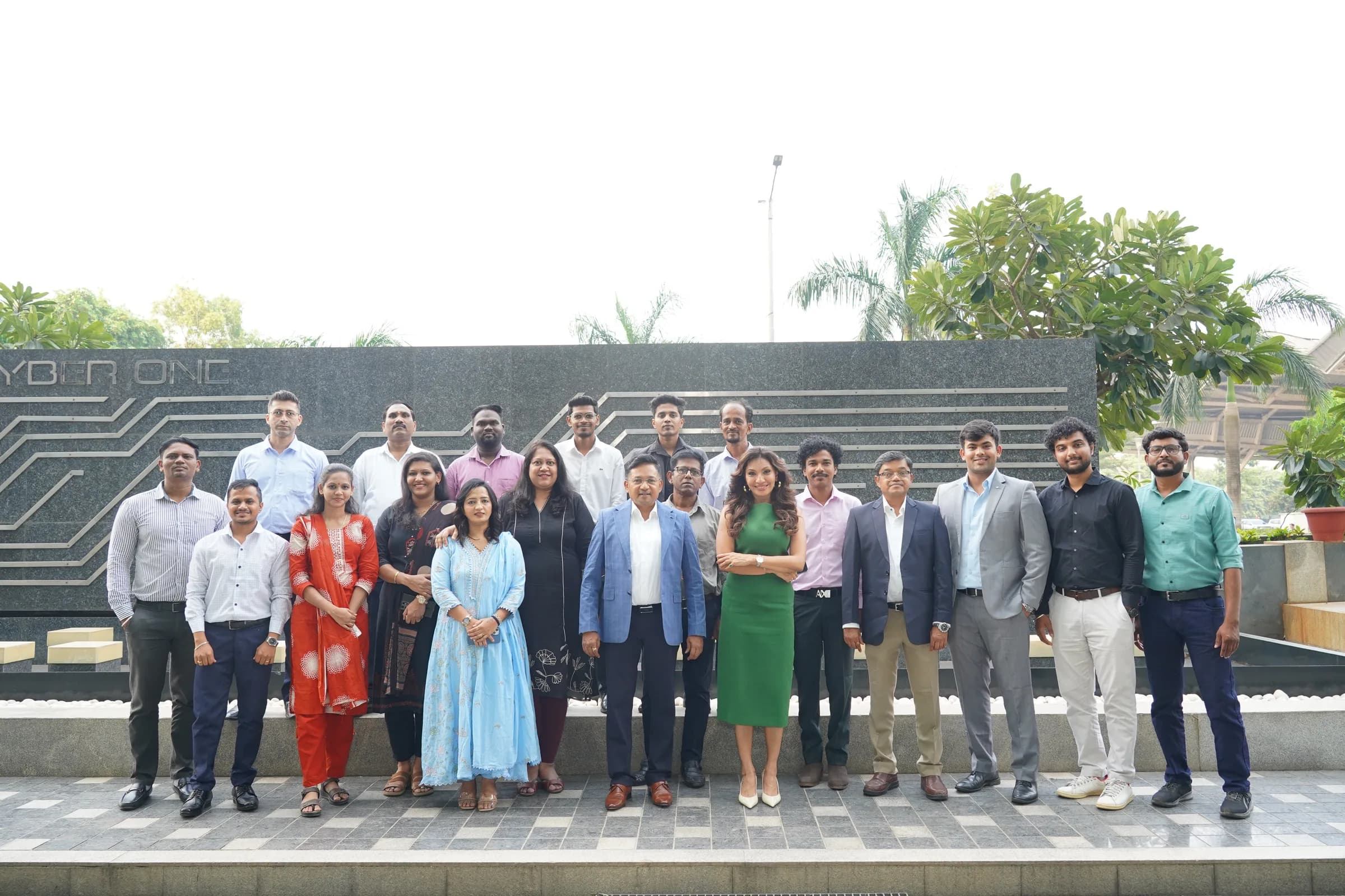 The KIPL team, around twenty people in two rows, in front of the Cyber One sign at Vashi, Navi Mumbai