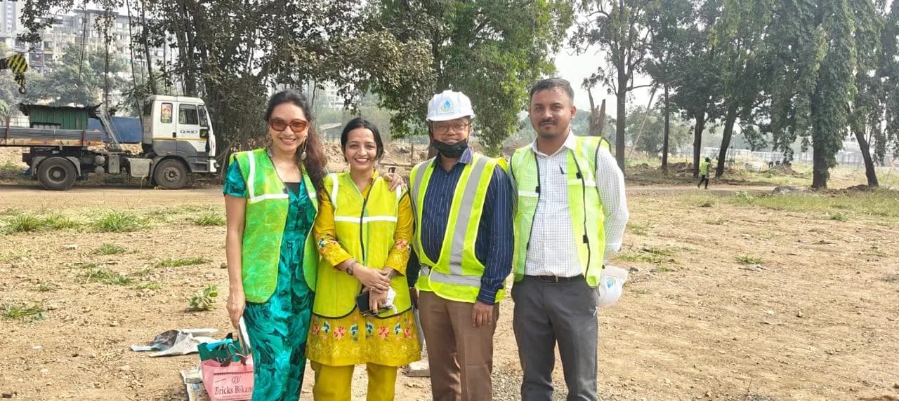 KIPL colleagues in hi-vis vests and hard hats on a client site