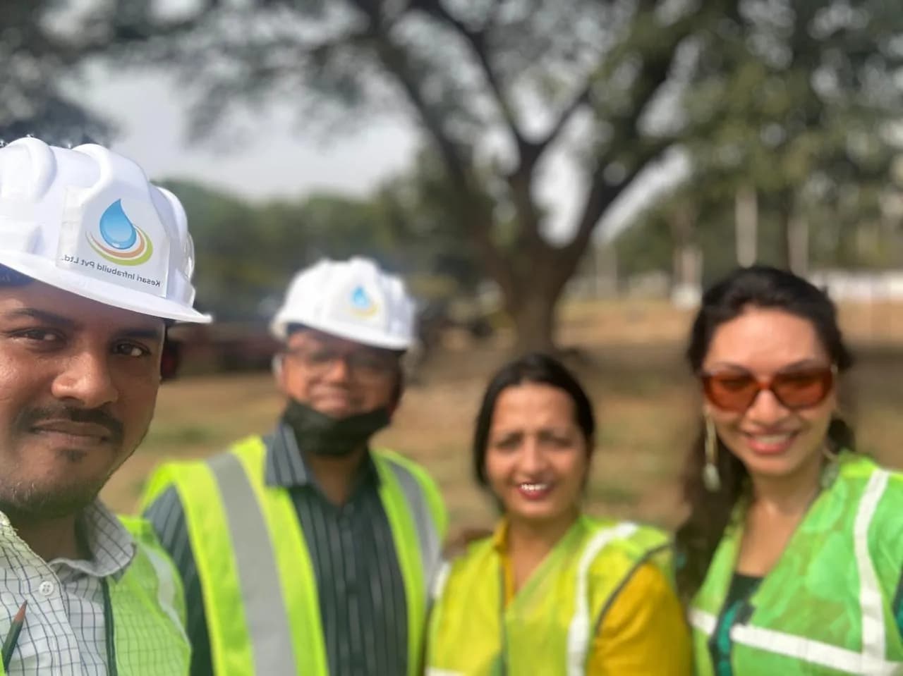 KIPL colleagues in hi-vis vests and hard hats on a client site